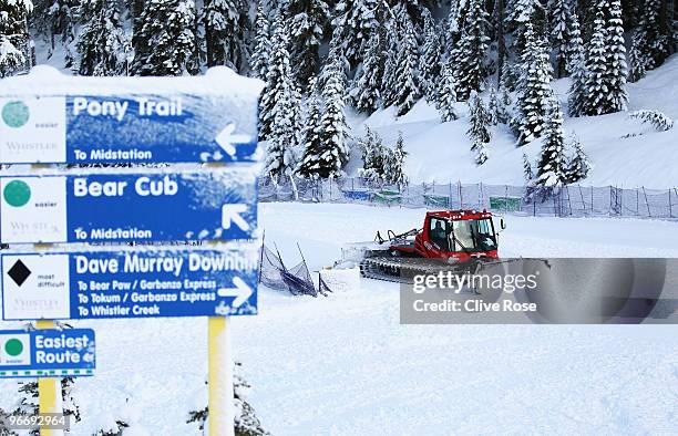 Snow plough clears the snow during the cancelled alpine skiing women's downhill training at Whistler Creek during the Vancouver 2010 Winter Olympics...