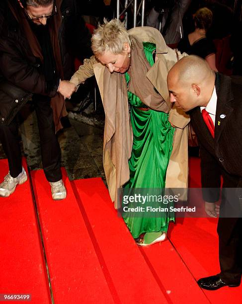 Director Doris Doerrie loses her shoe at the 'Die Friseuse' Premiere during day four of the 60th Berlin International Film Festival at...