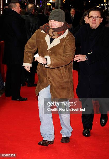 Hape Kerkeling runs into the cinema at the 'Die Friseuse' Premiere during day four of the 60th Berlin International Film Festival at...