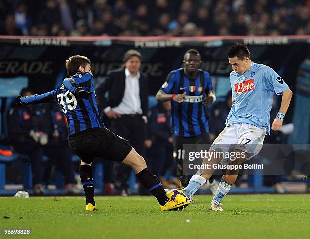 Davide Santon of Inter and Marek Hamsik of Napoli in action during the Serie A match between SSC Napoli and FC Internazionale Milano at Stadio San...