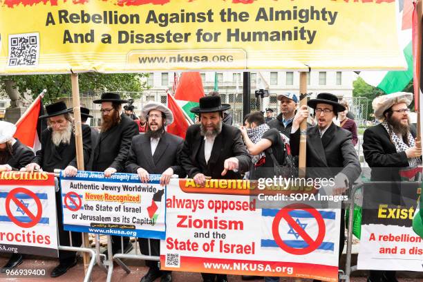 Neturei Karta protesters seen protesting against the Celebrate Israel Parade on Fifth Avenue in New York City. A parade hosted in New York City to...