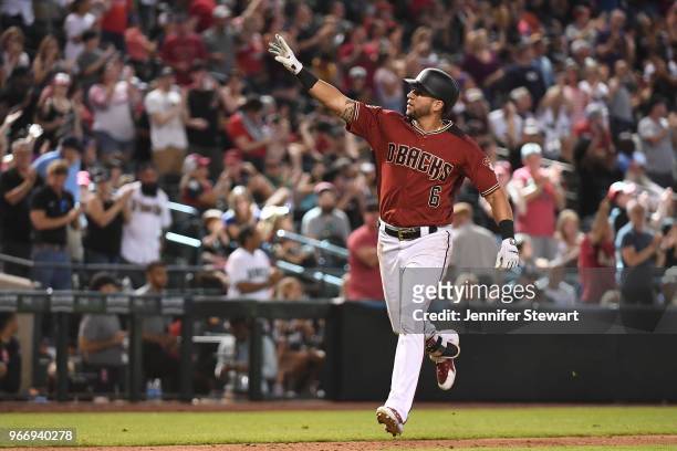 David Peralta of the Arizona Diamondbacks celebrates a solo home run in the eighth inning of the MLB game against the Miami Marlins at Chase Field on...