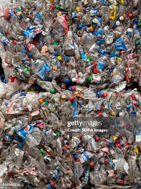 Bales of recycled used bottles. In Ukraine, enterprises for the processing of domestic waste are actively developing. Several such factories operate...