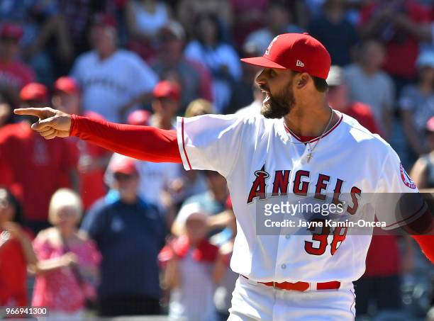 Justin Anderson of the Los Angeles Angels of Anaheim reacts after ball four was called on Joey Gallo of the Texas Rangers in the ninth inning of the...