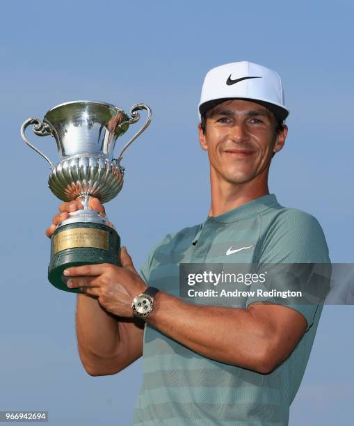 Thorbjorn Olesen of Denmark poses with the trophy after winning the Italian Open at Gardagolf Country Club on June 3, 2018 in Brescia, Italy.