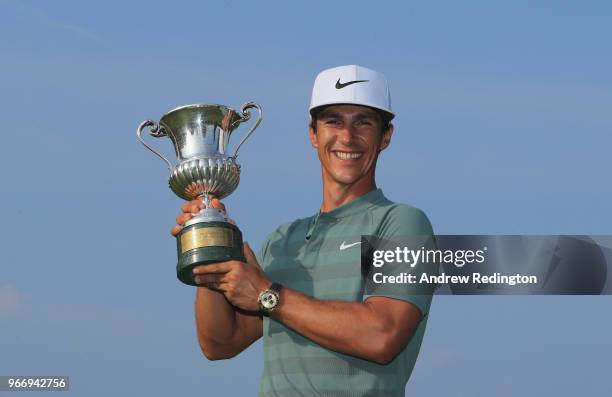 Thorbjorn Olesen of Denmark poses with the trophy after winning the Italian Open at Gardagolf Country Club on June 3, 2018 in Brescia, Italy.