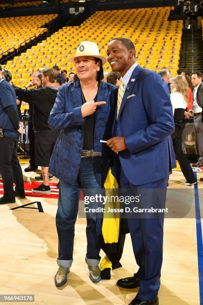 Carlos Santana and Isiah Thomas before the game between the Cleveland Cavaliers and the Golden State Warriors in Game Two of the 2018 NBA Finals on...