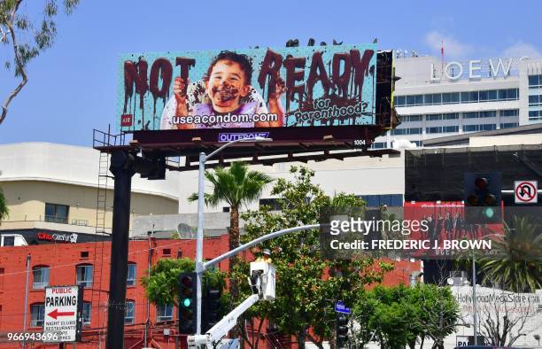 Billboard from the AIDS Healthcare Foundation promotes condom use as seen in Hollywood, California on May 17 amid a skyrocketing surge in sexually...