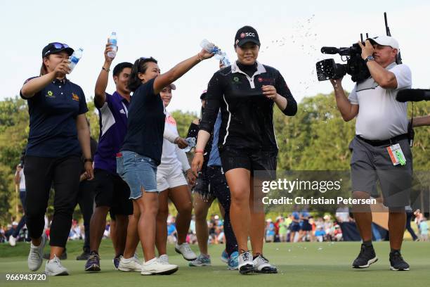 Ariya Jutanugarn of Thailand is doused with water after winning the 2018 U.S. Women's Open at Shoal Creek on June 3, 2018 in Shoal Creek, Alabama.