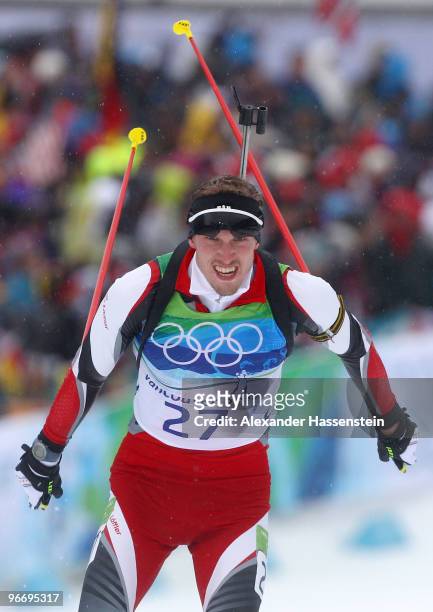 Dominik Landertinger of Austria competes in the men's biathlon 10 km sprint final on day 3 of the 2010 Winter Olympics at Whistler Olympic Park...