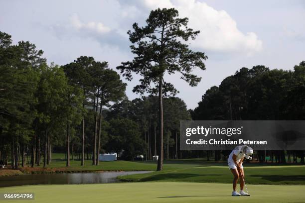 Hyo-Joo Kim of South Korea reacts to a missed putt on the 18th green during the final round of the 2018 U.S. Women's Open at Shoal Creek on June 3,...