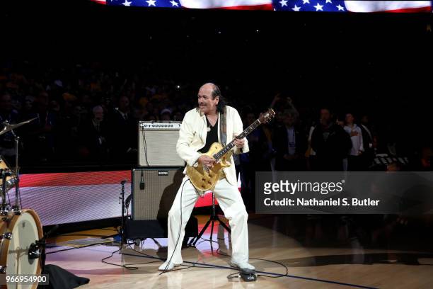 Carlos Santana performs the National Anthem before Game Two of the 2018 NBA Finals between the Cleveland Cavaliers and the Golden State Warriors on...