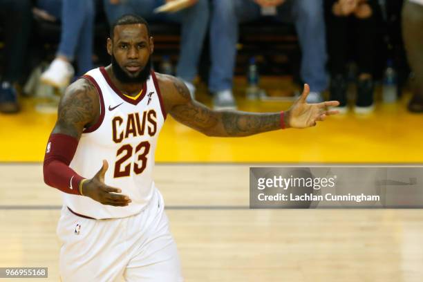 LeBron James of the Cleveland Cavaliers reacts against the Golden State Warriors during the first half in Game 2 of the 2018 NBA Finals at ORACLE...