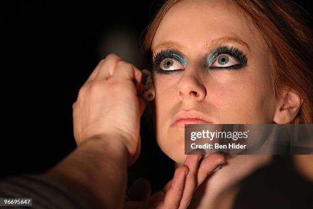Model prepares backstage at the Leanne Marshall Fall 2010 fashion show at The Union Square Ballroom on February 14, 2010 in New York City.