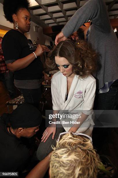 Models prepare backstage at the Leanne Marshall Fall 2010 fashion show at The Union Square Ballroom on February 14, 2010 in New York City.
