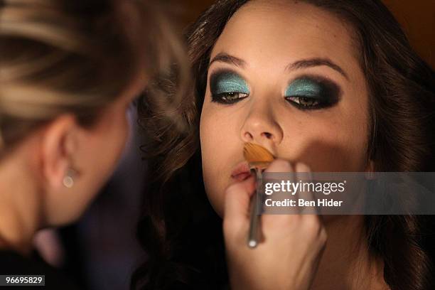 Model prepares backstage at the Leanne Marshall Fall 2010 fashion show at The Union Square Ballroom on February 14, 2010 in New York City.