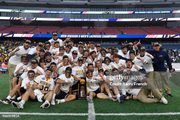 Merrimack College celebrates their victory over Saint Leo University during the Division II Men's Lacrosse Championship held at Gillette Stadium on...