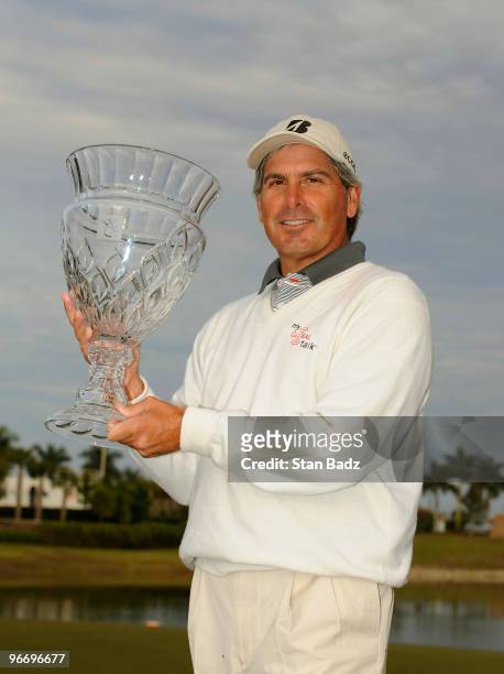 Fred Couples holds the winner's trophy after the final round of The ACE Group Classic at The Quarry on February 14, 2010 in Naples, Florida. This was...