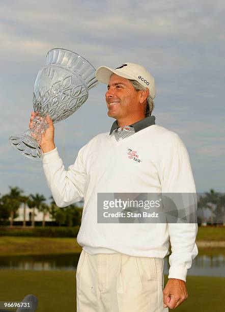 Fred Couples holds the winner's trophy after the final round of The ACE Group Classic at The Quarry on February 14, 2010 in Naples, Florida. This was...