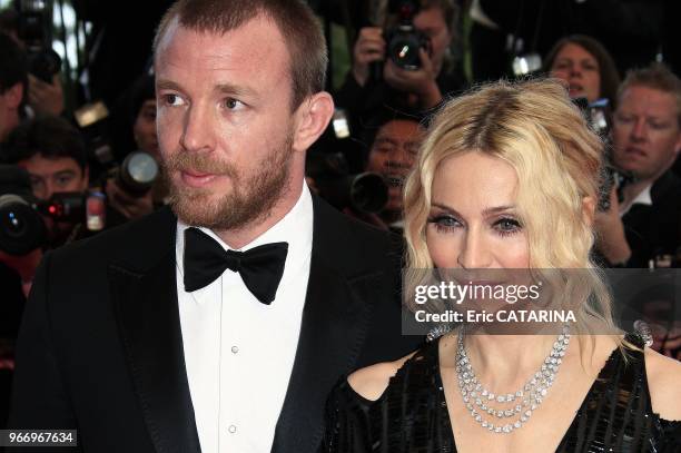 Madonna and Sharon Stone Madonna on the Red Carpet in Cannes to promote 'I Am Because We Are'. Madonna wears Chopard jewels.