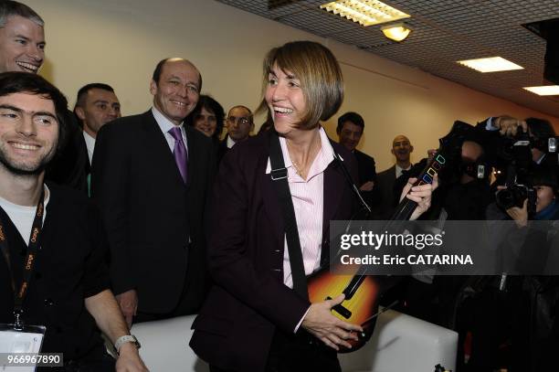 French Minister of Culture Christine Albanel Launches the 43rd edition of the Midem Music Market and testes her virtuosity at the 'Guitar Hero' game.