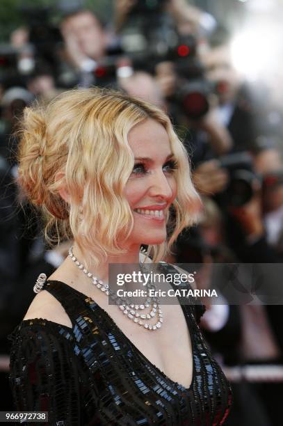 Madonna on the Red Carpet in Cannes to promote 'I Am Because We Are'. Madonna wears Chopard jewels.