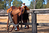 Western Horse Saddle and Fence