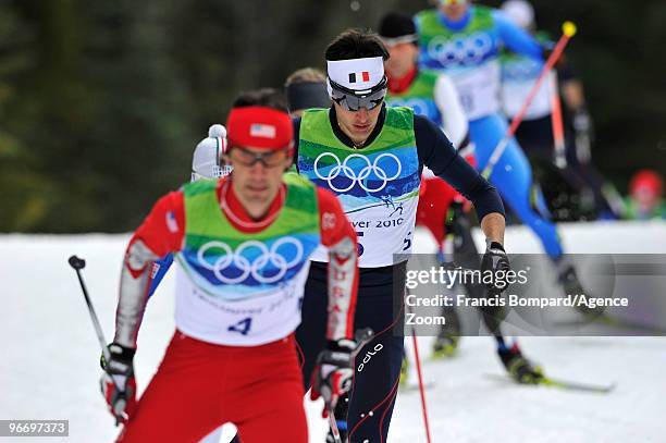 Jason Lamy Chappuis of France takes gold medal, Johnny Spillane of the USA takes Silver Medal during the Nordic Combined Individual NH/10km on Day 3...