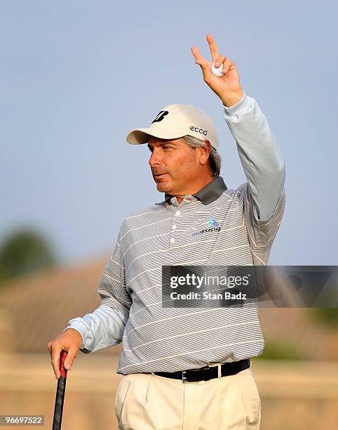 Fred Couples waves his golf ball after winning his first Champions Tour event during the final round of The ACE Group Classic at The Quarry on...