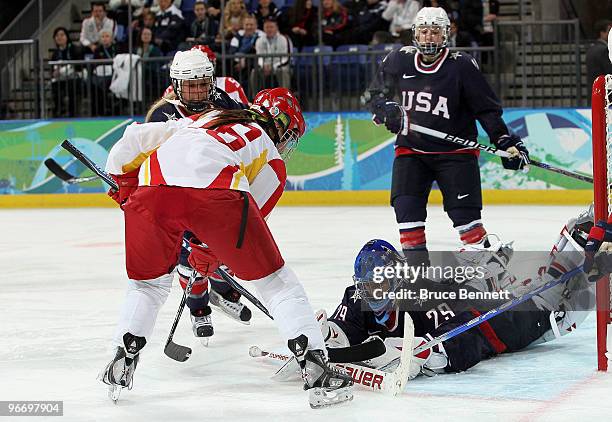 Brianne Mclaughlin of the United States makes a save against China during their women's ice hockey preliminary game at UBC Thunderbird Arena on...