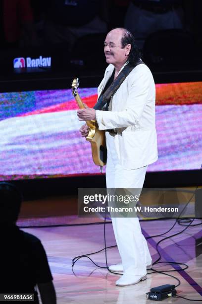 Carlos Santana performs the national anthem prior to Game 2 of the 2018 NBA Finals between the Golden State Warriors and the Cleveland Cavaliers at...