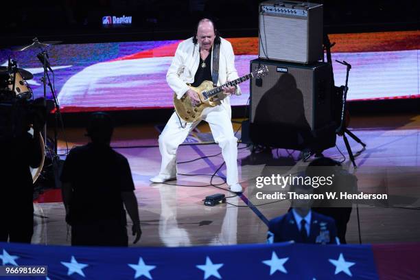 Carlos Santana performs the national anthem prior to Game 2 of the 2018 NBA Finals between the Golden State Warriors and the Cleveland Cavaliers at...