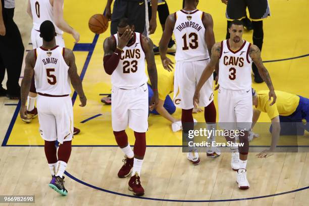 LeBron James and George Hill of the Cleveland Cavaliers reacts during the game against the Golden State Warriors during the second quarter in Game 2...