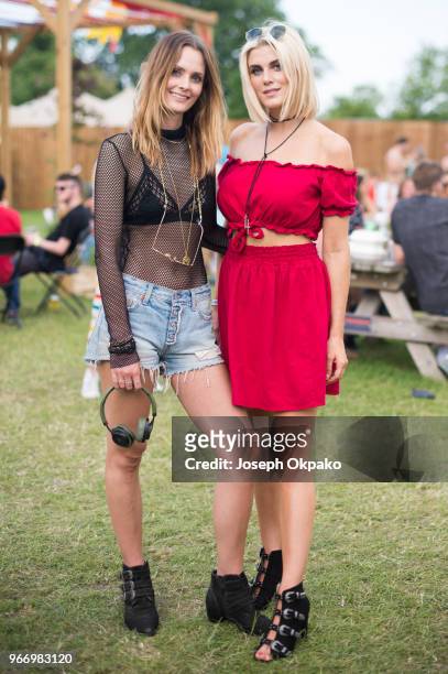 Charlotte de Carle and Ashley James pose backstage at Mighty Hoopla festival at Brockwell Park on June 3, 2018 in London, England.