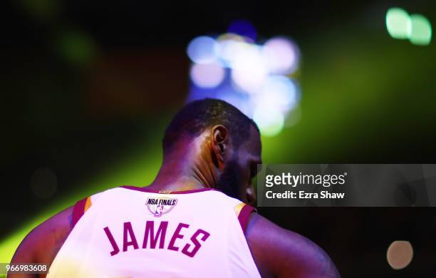 LeBron James of the Cleveland Cavaliers looks on against the Golden State Warriors in Game 2 of the 2018 NBA Finals at ORACLE Arena on June 3, 2018...