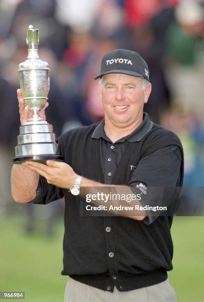 Mark O''Meara of the USA holds aloft the Claret Jug after winning the British Open played at Royal Birkdale Golf Club in Southport, Merseyside,...