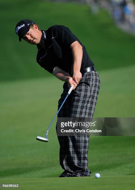 Bryce Molder putts for birdie on during the final round of the AT&T Pebble Beach National Pro-Am at Pebble Beach Golf Links on February 14, 2010 in...