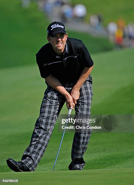 Bryce Molder putts for birdie on during the final round of the AT&T Pebble Beach National Pro-Am at Pebble Beach Golf Links on February 14, 2010 in...