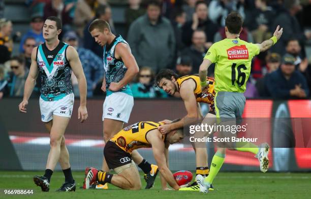 Luke Breust of the Hawks recieves a free kick from the umpire during the round 11 AFL match between the Hawthorn Hawks and the Port Adelaide Power at...