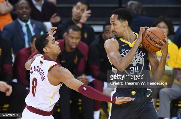 Shaun Livingston of the Golden State Warriors controls the ball against Jordan Clarkson of the Cleveland Cavaliers in Game 2 of the 2018 NBA Finals...