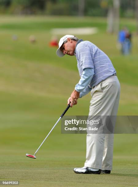 Fred Couples watches his putt on the fifth green during the final round of The ACE Group Classic at The Quarry on February 14, 2010 in Naples,...