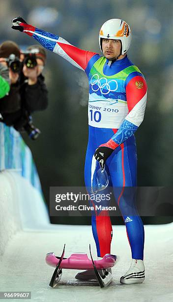 Albert Demtschenko of Russia acknowledges the crowd after finishing the final run of the men's luge singles final on day 3 of the 2010 Winter...