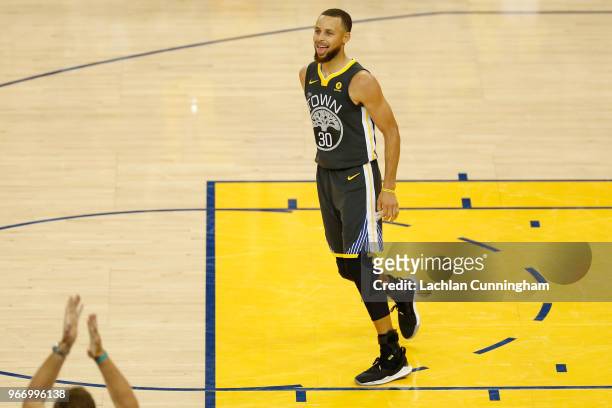 Stephen Curry of the Golden State Warriors reacts against the Cleveland Cavaliers during the fourth quarter in Game 2 of the 2018 NBA Finals at...