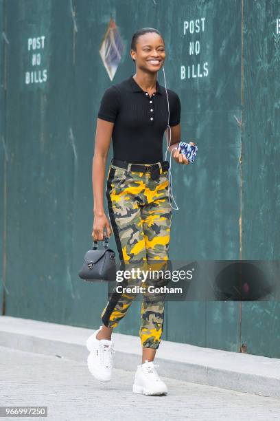 Mayowa Nicholas arrives for the Alexander Wang resort fashion show at Pier 17 on June 3, 2018 in New York City.