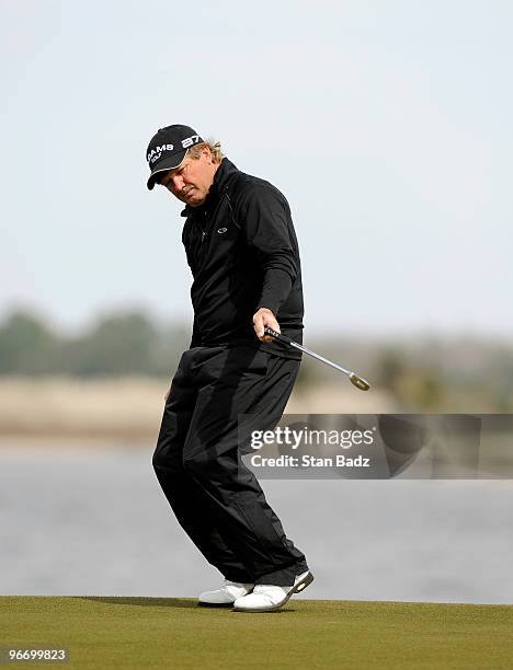 Gene Jones reacts to his putt at the first green during the final round of The ACE Group Classic at The Quarry on February 14, 2010 in Naples,...