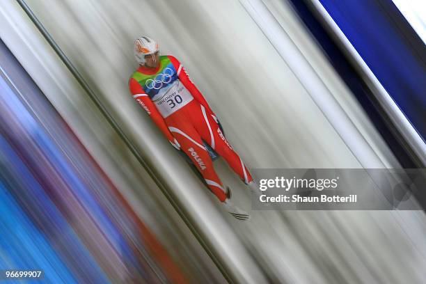 Maciej Kurowski of Poland competes during the final run of the men's luge singles final on day 3 of the 2010 Winter Olympics at Whistler Sliding...