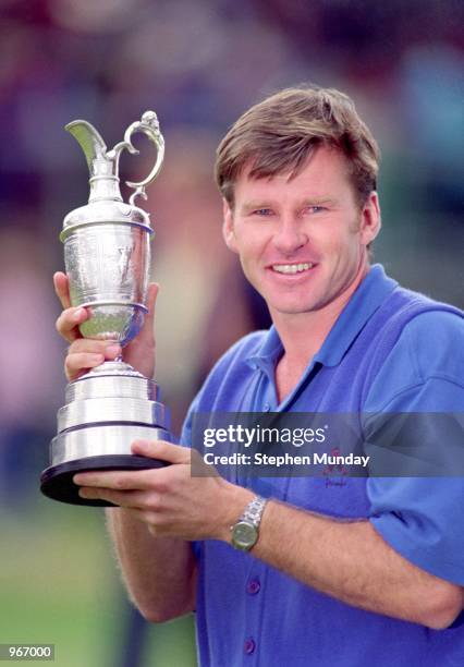 Nick Faldo of England holds aloft the Claret Jug after winning the British Open played at Muirfield in Scotland. \ Mandatory Credit: Stephen Munday...