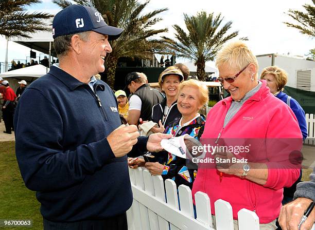 Jay Haas signs autographs for happy fans during the final round of The ACE Group Classic at The Quarry on February 14, 2010 in Naples, Florida.