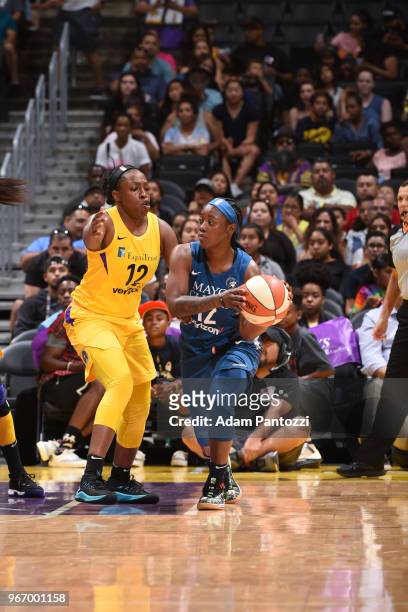 Alexis Jones of the Minnesota Lynx handles the ball agaionst Chelsea Gray of the Los Angeles Sparks on June 3, 2018 at STAPLES Center in Los Angeles,...