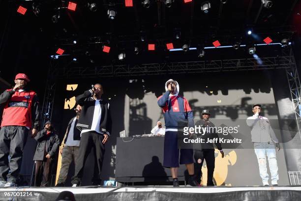 Ghostface Killah, U-God, GZA, Cappadonna, Inspectah Deck and RZA of Wu-Tang Clan perform on the Colossal Stage during Clusterfest at Civic Center...